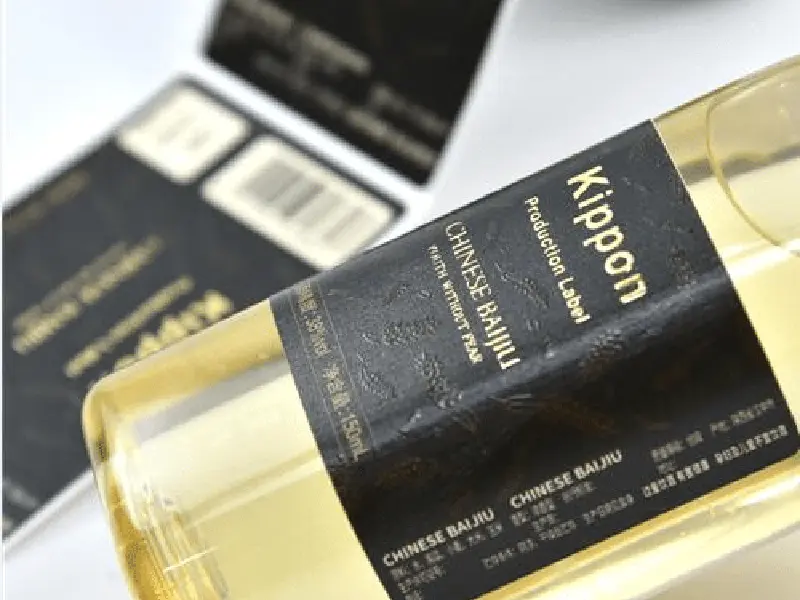 How to ensure that the wine bottle sticker is intact and brand new when it comes out of the ice bucket?